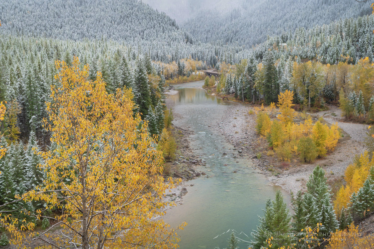 Autumn snow along the Middle Fork Flathead River. Glacier National Park, Montana