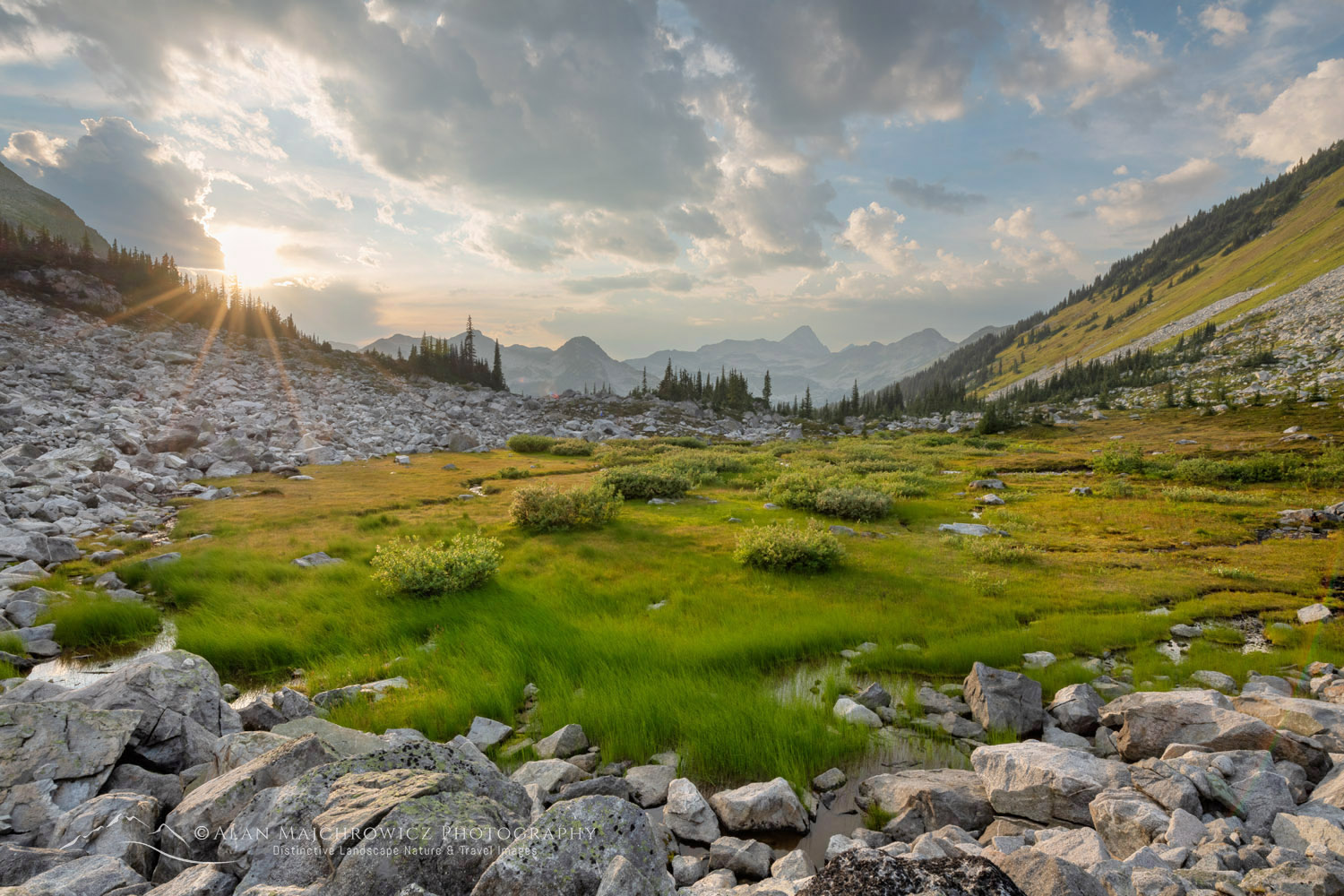 Dramatic clouds over alpine meadows below Mount Rohr. Coast Range, British Columbia