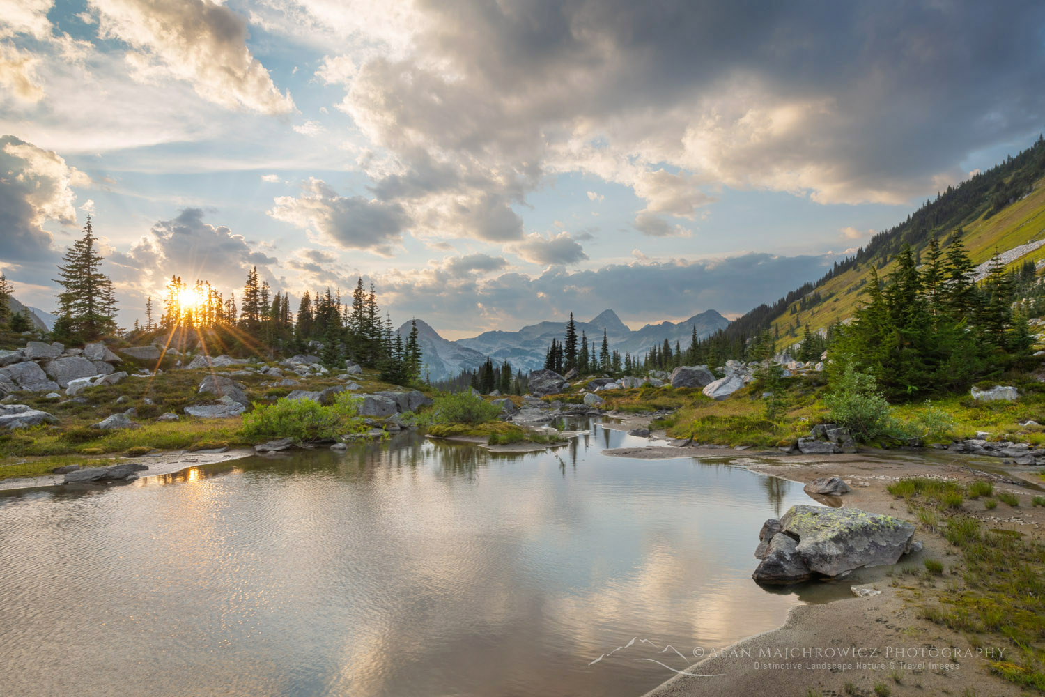 Dramatic clouds over alpine meadows below Mount Rohr. Coast Range, British Columbia