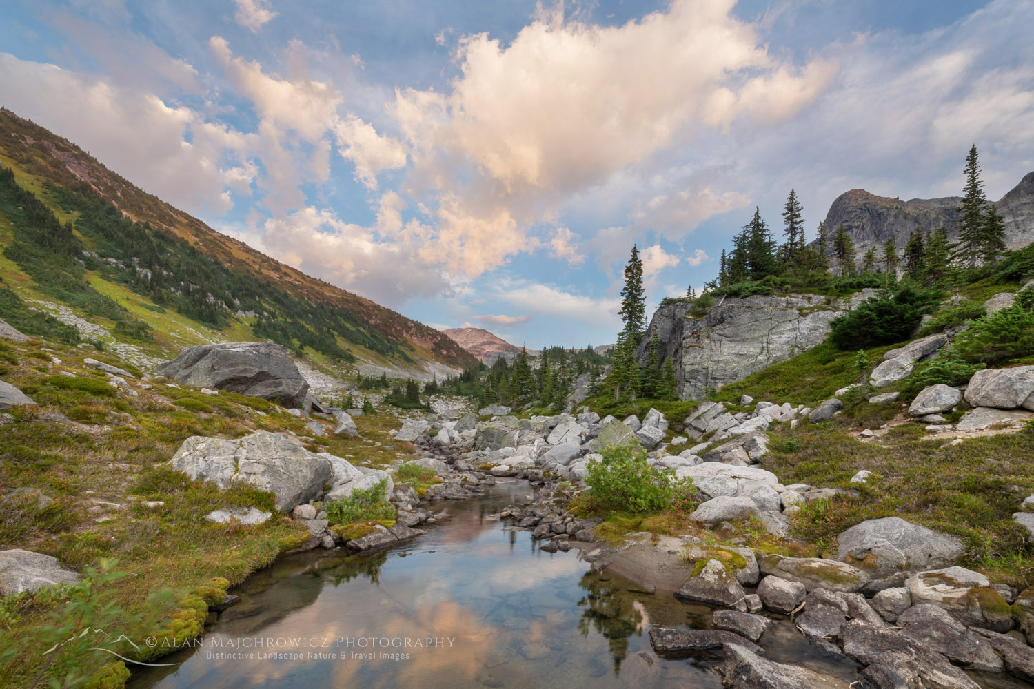 Evening clouds over alpine basin of Mount Rohr. Coast Range British Columbia