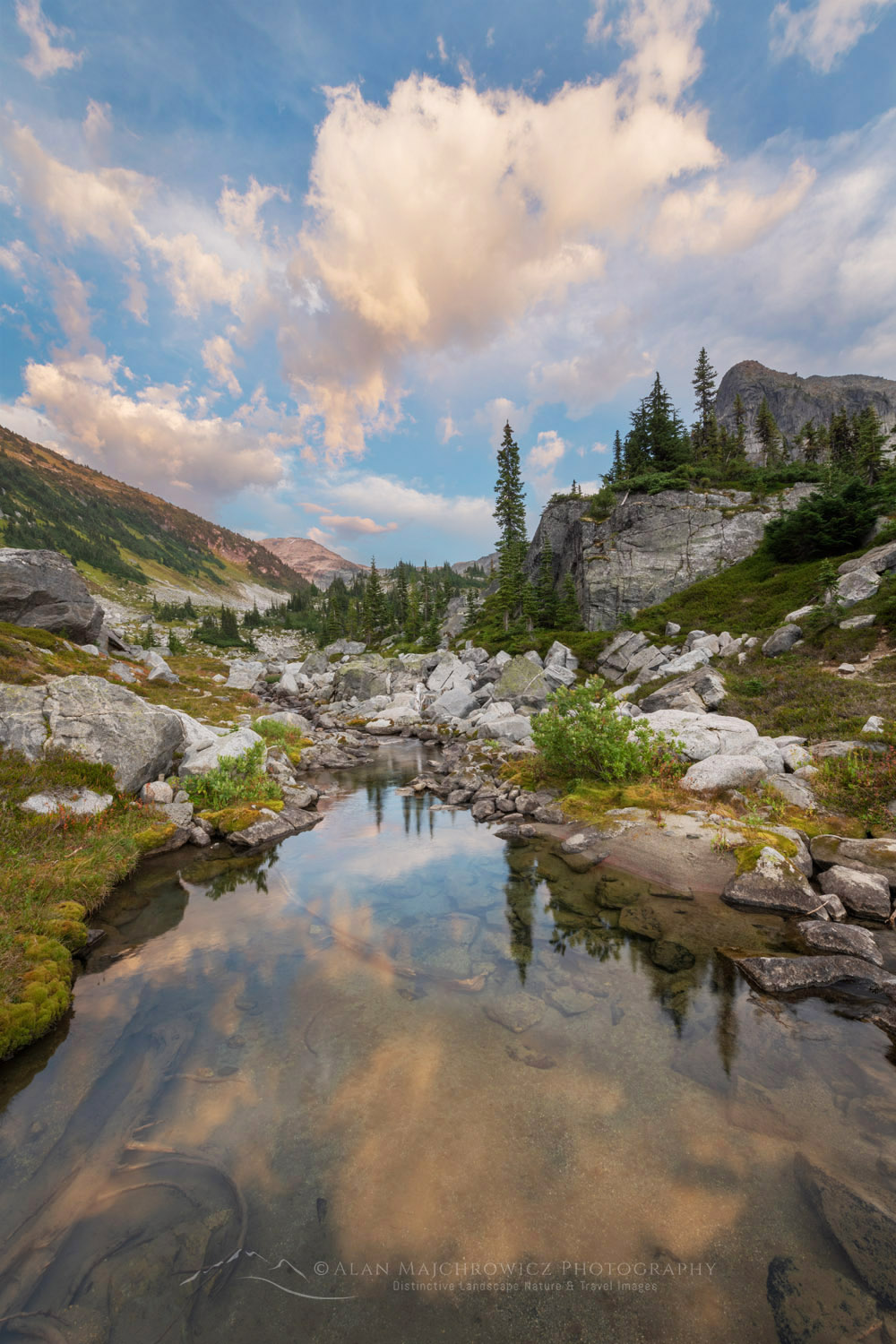 Evening clouds over alpine basin of Mount Rohr. Coast Range British Columbia