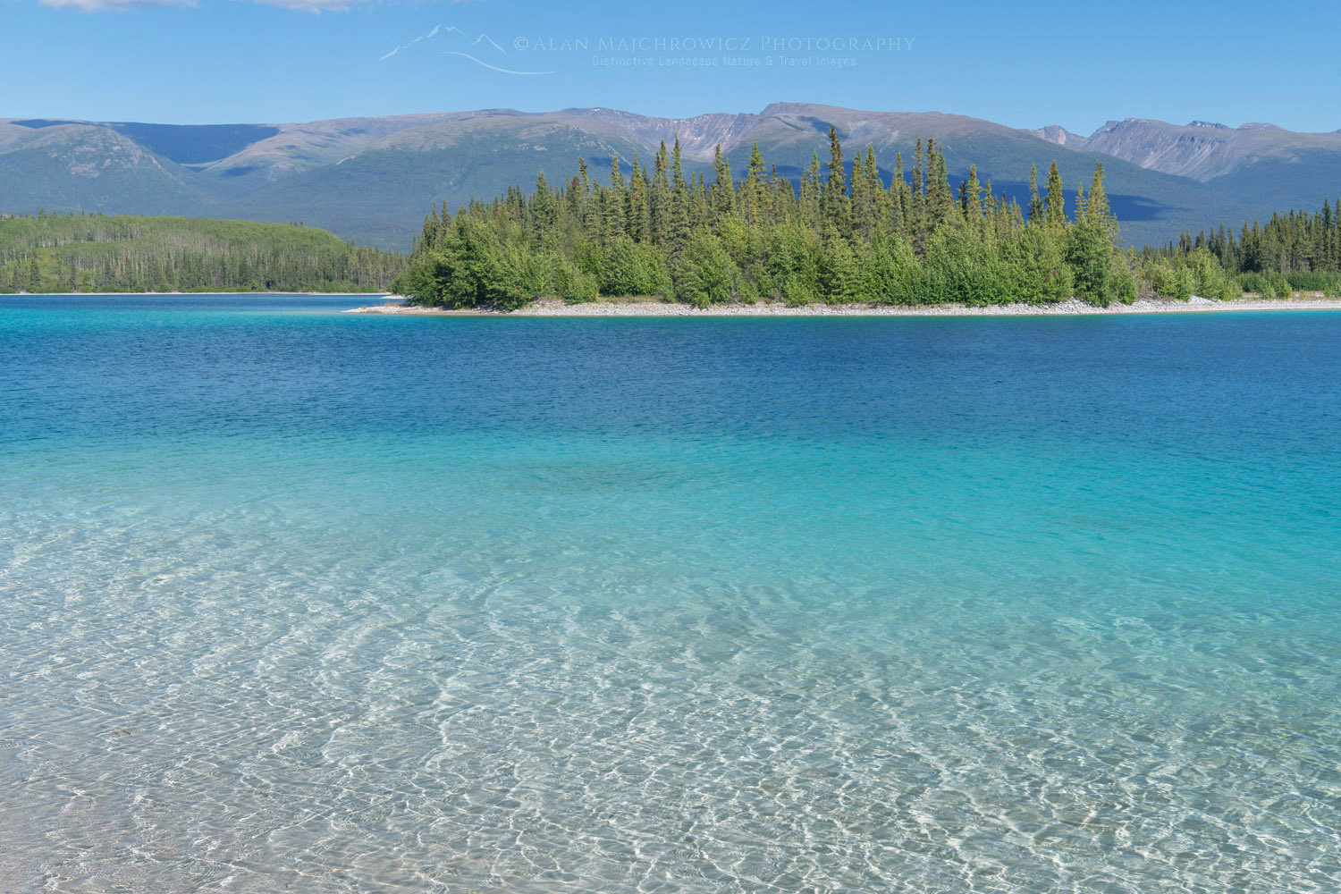 Turquoise waters of Tā Ch'ilā Park (Boya Lake Park) British Columbia #86925