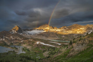 Sunrise rainbow over Limestone Lakes Basin. Height of the Rockies Provincial Park British Columbia