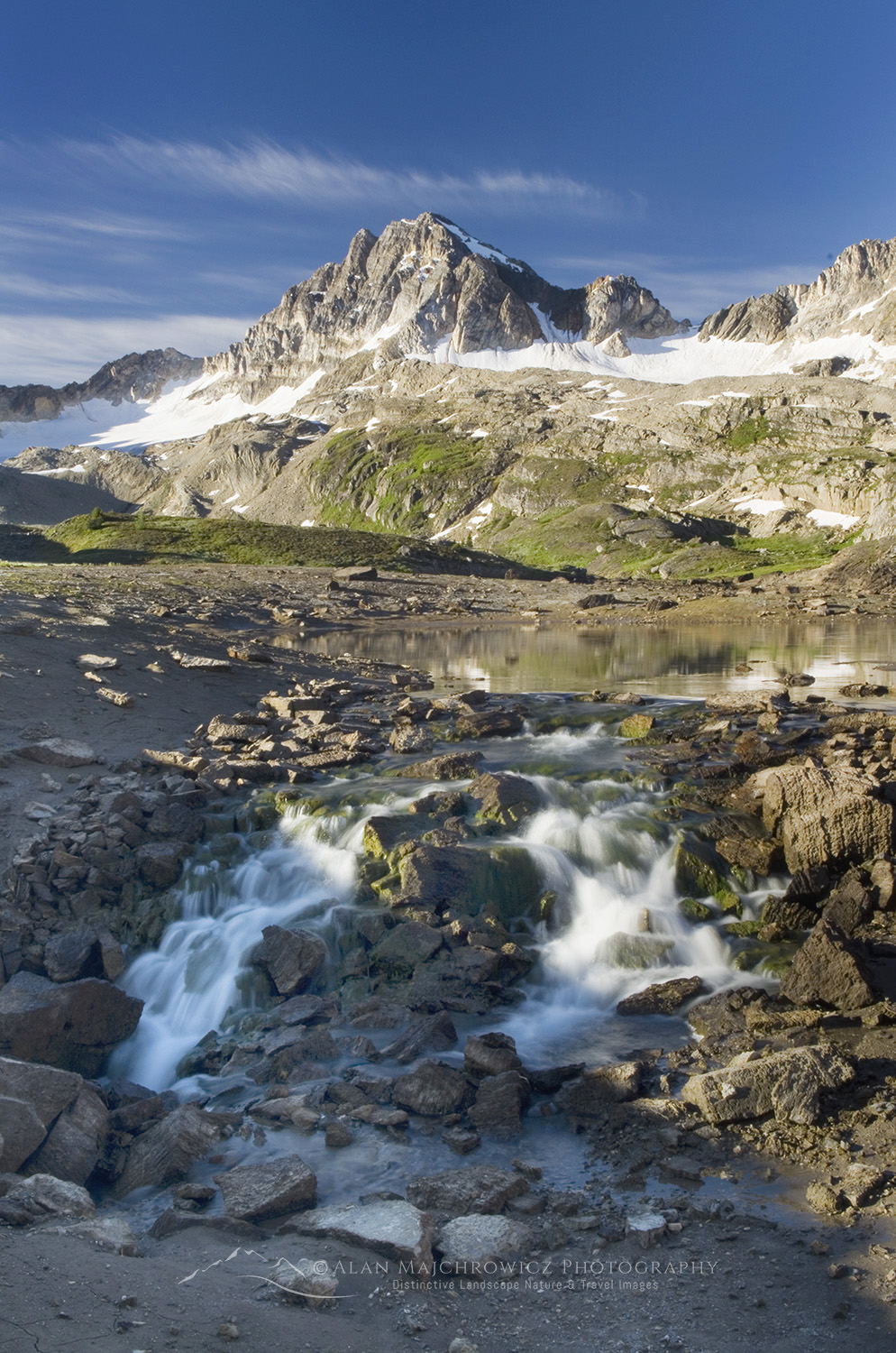 Small lake draining into a sinkhole in Limestone Lakes Basin, Height of the Rockies Provincial Park British Columbia #46177
