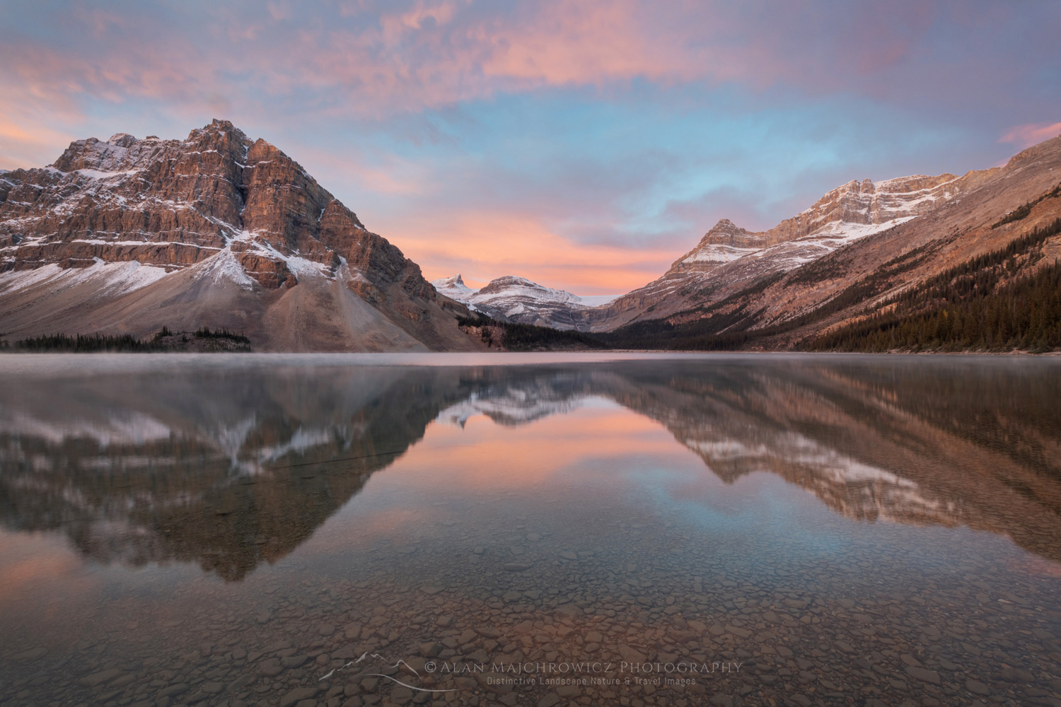 Sunrise over Bow Lake with Crowfoot Mountain (L) and Waputik Mountains (R) in the distance. Banff National Park. Alberta, Canada #88690