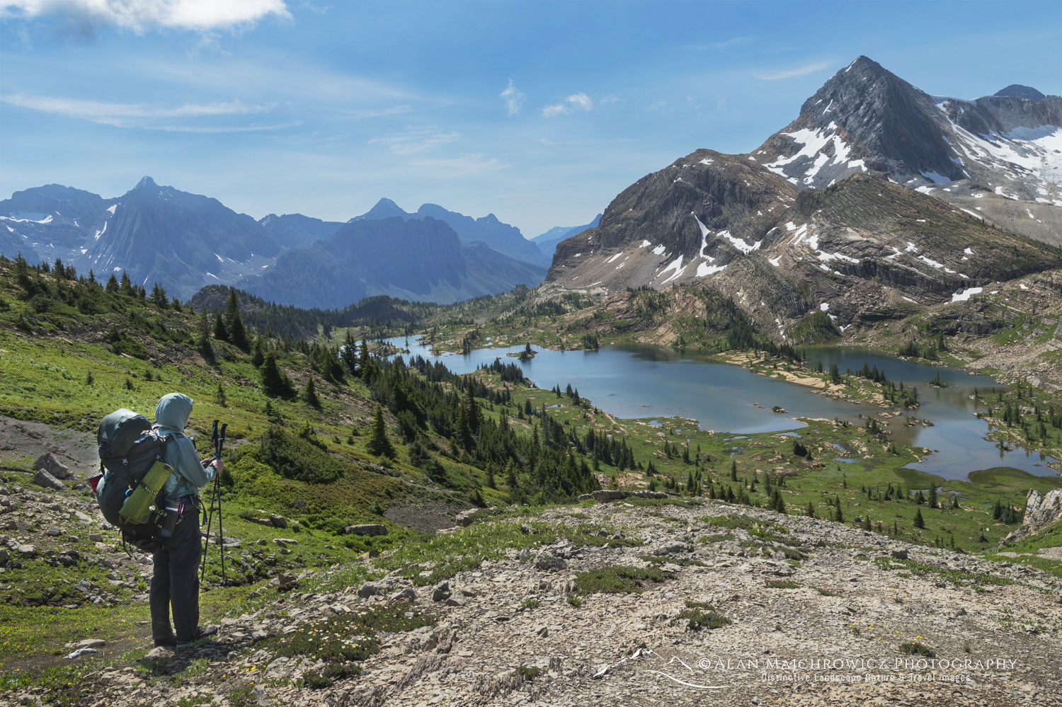 Backpacker overlooking Limestone Lakes Basin in Height of the Rockies Provincial Park British Columbia #86390