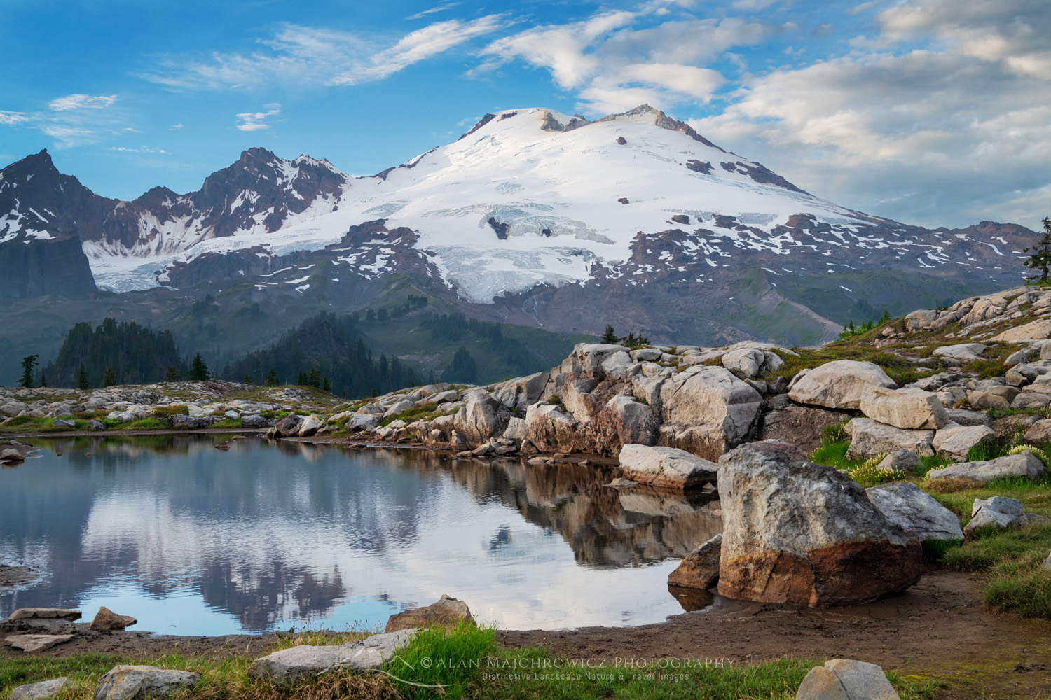 Mount Baker's south face reflected in a tarn in the alpine meadows of Mt. Baker National Recreation Area. North Cascades, Washington #88270