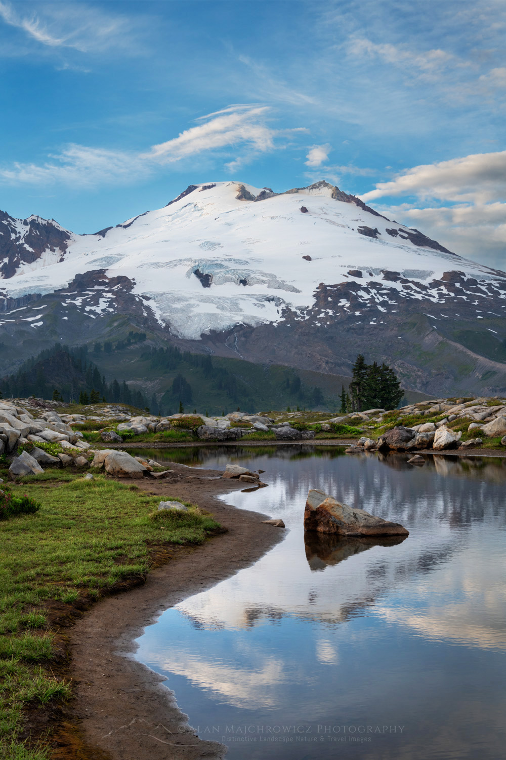 Mount Baker's south face reflected in a tarn in the alpine meadows of Mt. Baker National Recreation Area. North Cascades, Washington #88272