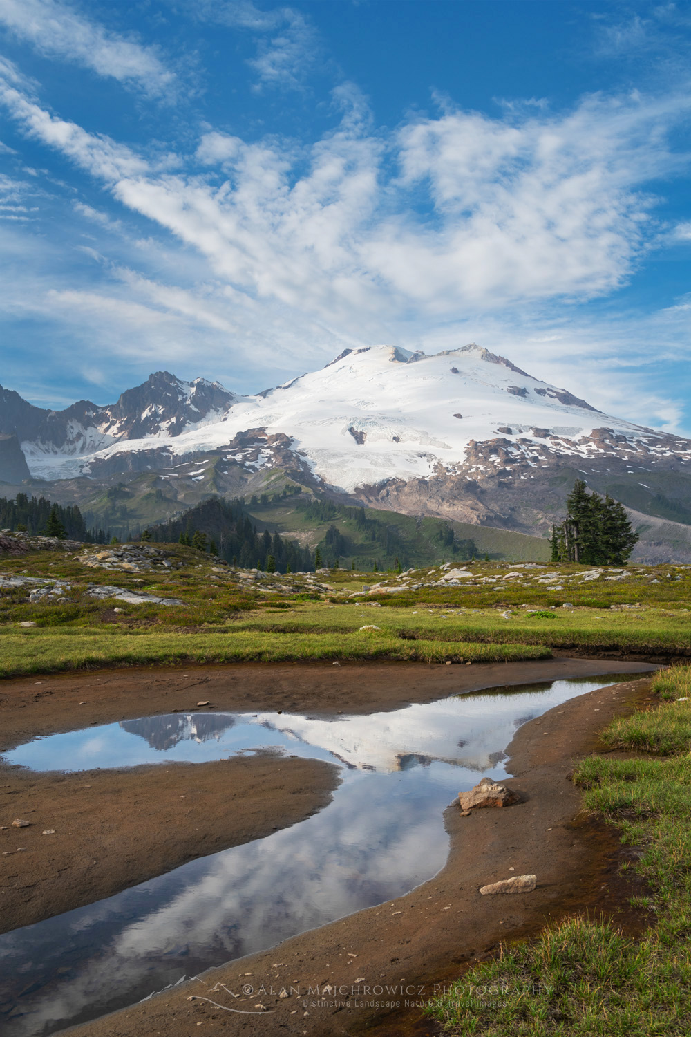 Mount Baker's south face reflected in a tarn in the alpine meadows of Mt. Baker National Recreation Area. North Cascades, Washington #88246