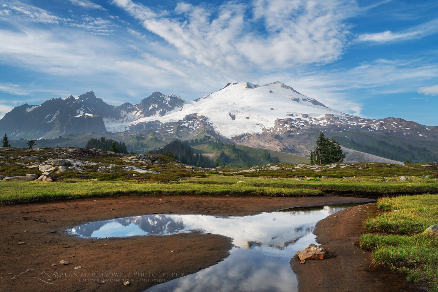 Mount Baker's south face reflected in a tarn in the alpine meadows of Mt. Baker National Recreation Area. North Cascades, Washington #88247