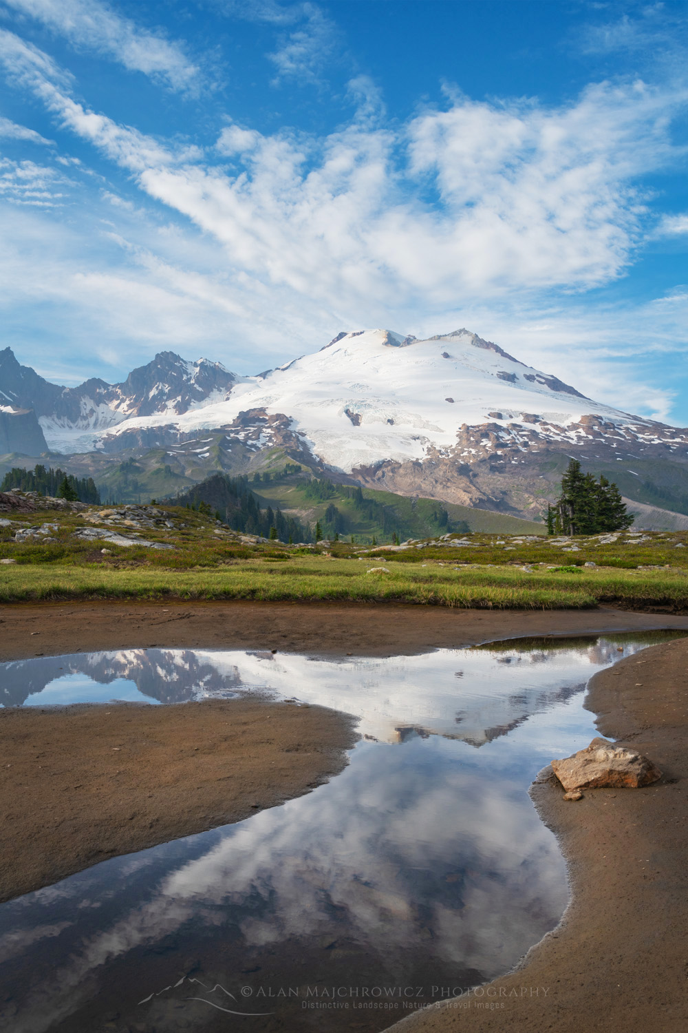 Mount Baker's south face reflected in a tarn in the alpine meadows of Mt. Baker National Recreation Area. North Cascades, Washington #88248
