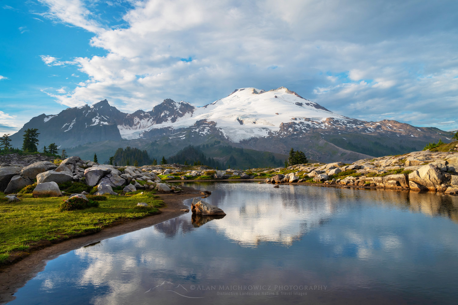 Mount Baker's south face reflected in a tarn in the alpine meadows of Mt. Baker National Recreation Area. North Cascades, Washington #88252